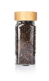 Photo of Peppercorns in glass jar isolated on white. Aromatic spice