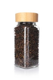 Photo of Peppercorns in glass jar isolated on white. Aromatic spice