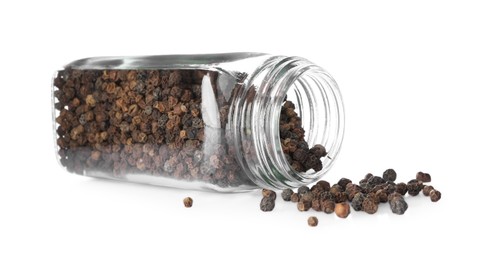 Photo of Peppercorns in glass jar isolated on white. Aromatic spice