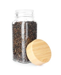 Photo of Peppercorns in glass jar isolated on white. Aromatic spice