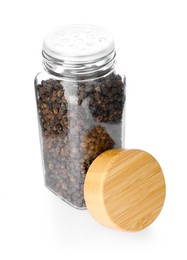 Photo of Peppercorns in glass jar isolated on white. Aromatic spice