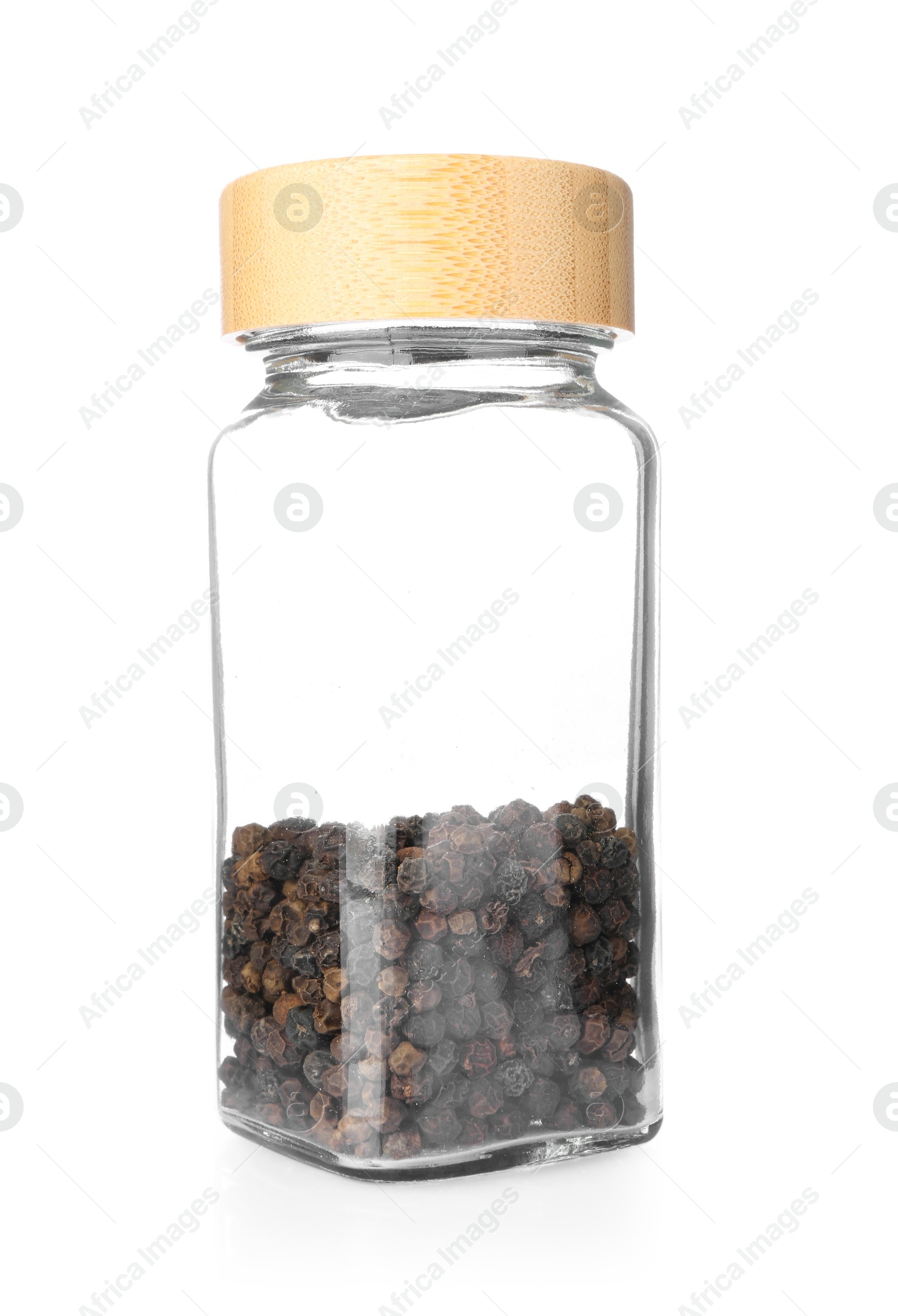 Photo of Peppercorns in glass jar isolated on white. Aromatic spice