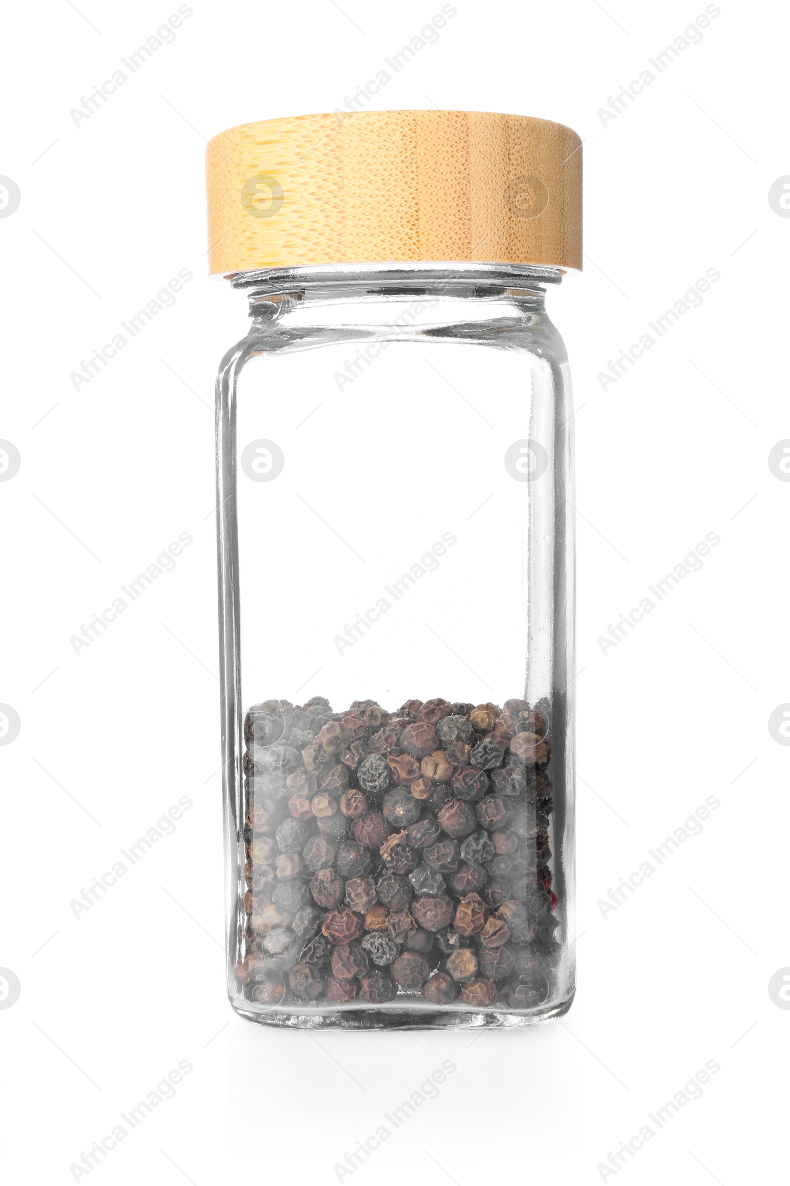 Photo of Peppercorns in glass jar isolated on white. Aromatic spice