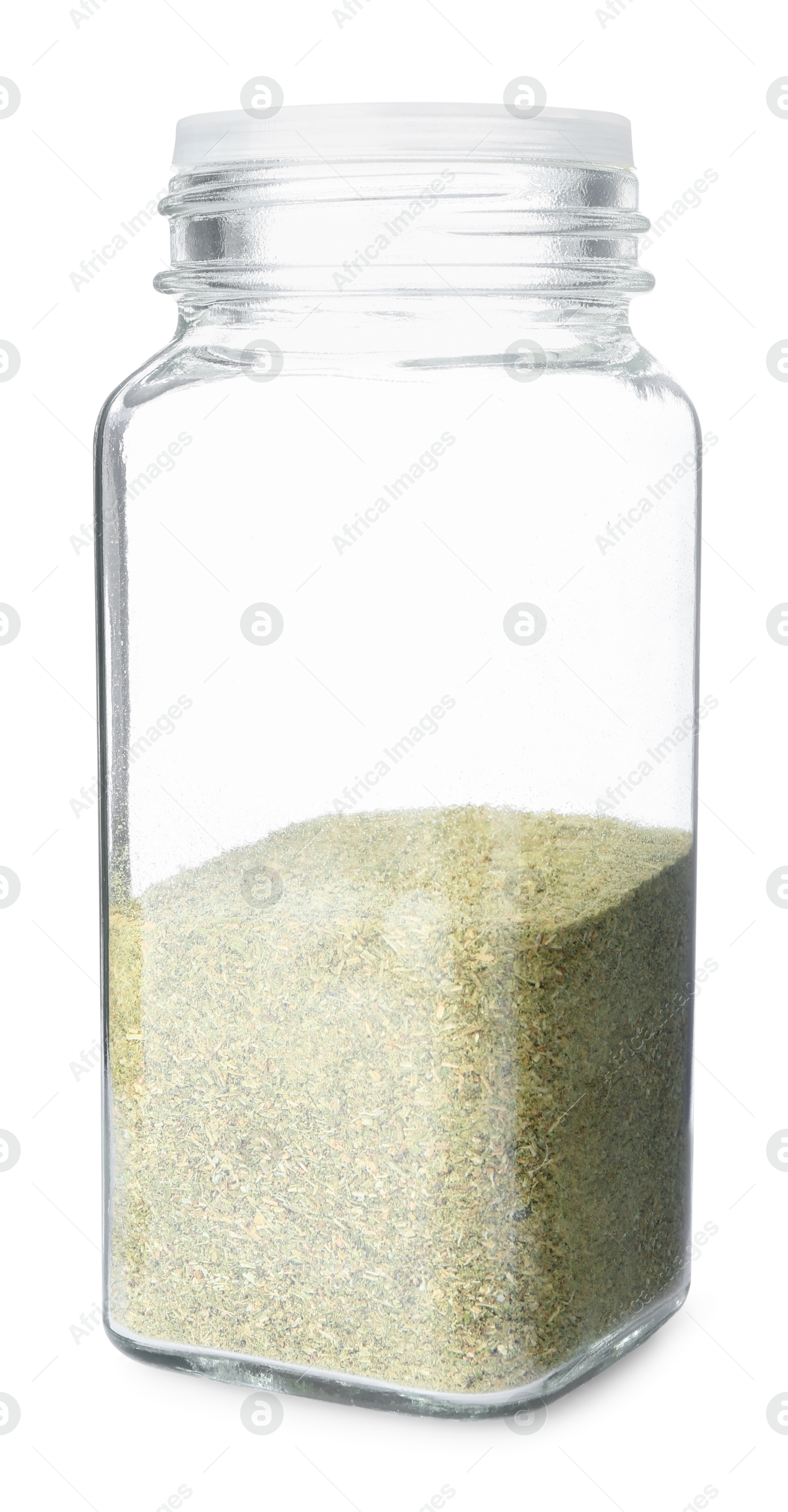 Photo of Dried basil powder in glass jar isolated on white. Aromatic spice