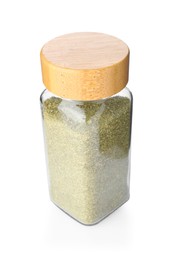 Photo of Dried basil powder in glass jar isolated on white. Aromatic spice