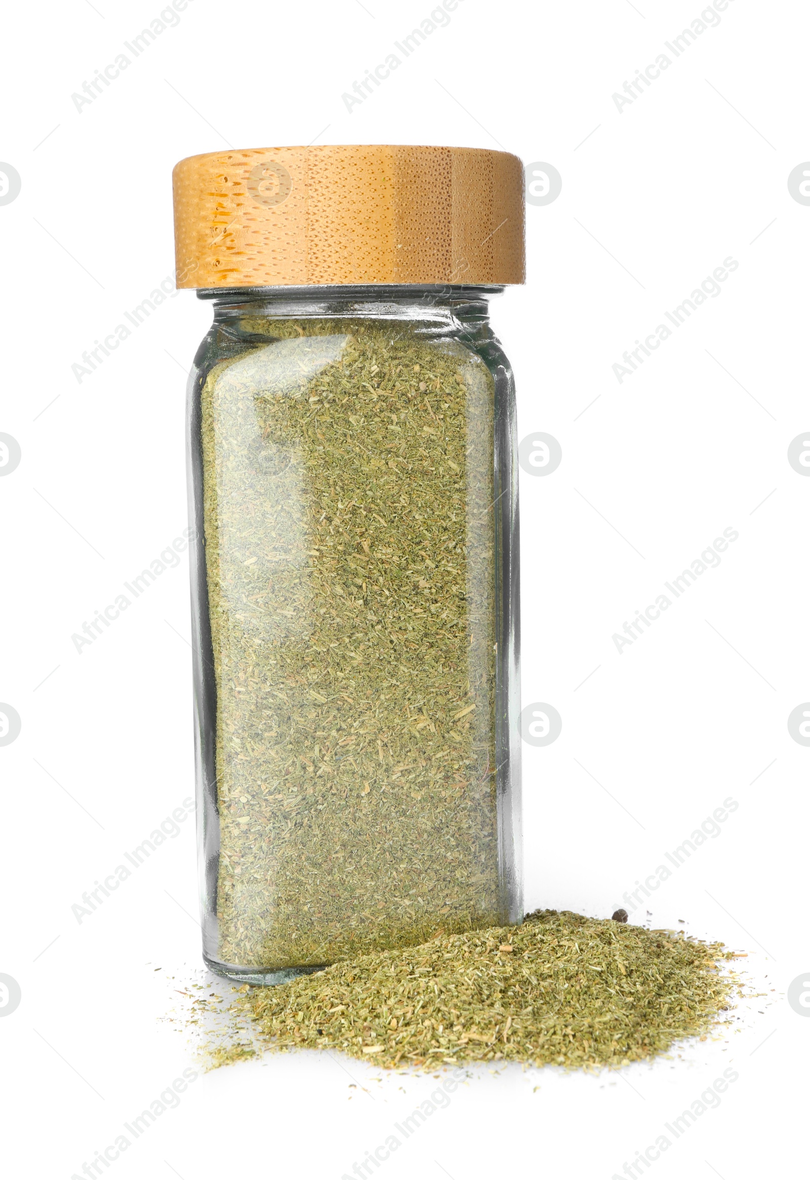 Photo of Dried basil powder in glass jar isolated on white. Aromatic spice