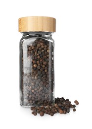 Photo of Peppercorns in glass jar isolated on white. Aromatic spice