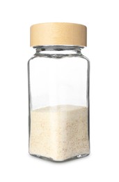 Photo of Garlic powder in glass jar isolated on white. Aromatic spice