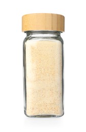 Photo of Garlic powder in glass jar isolated on white. Aromatic spice