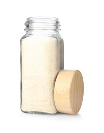 Photo of Garlic powder in glass jar isolated on white. Aromatic spice