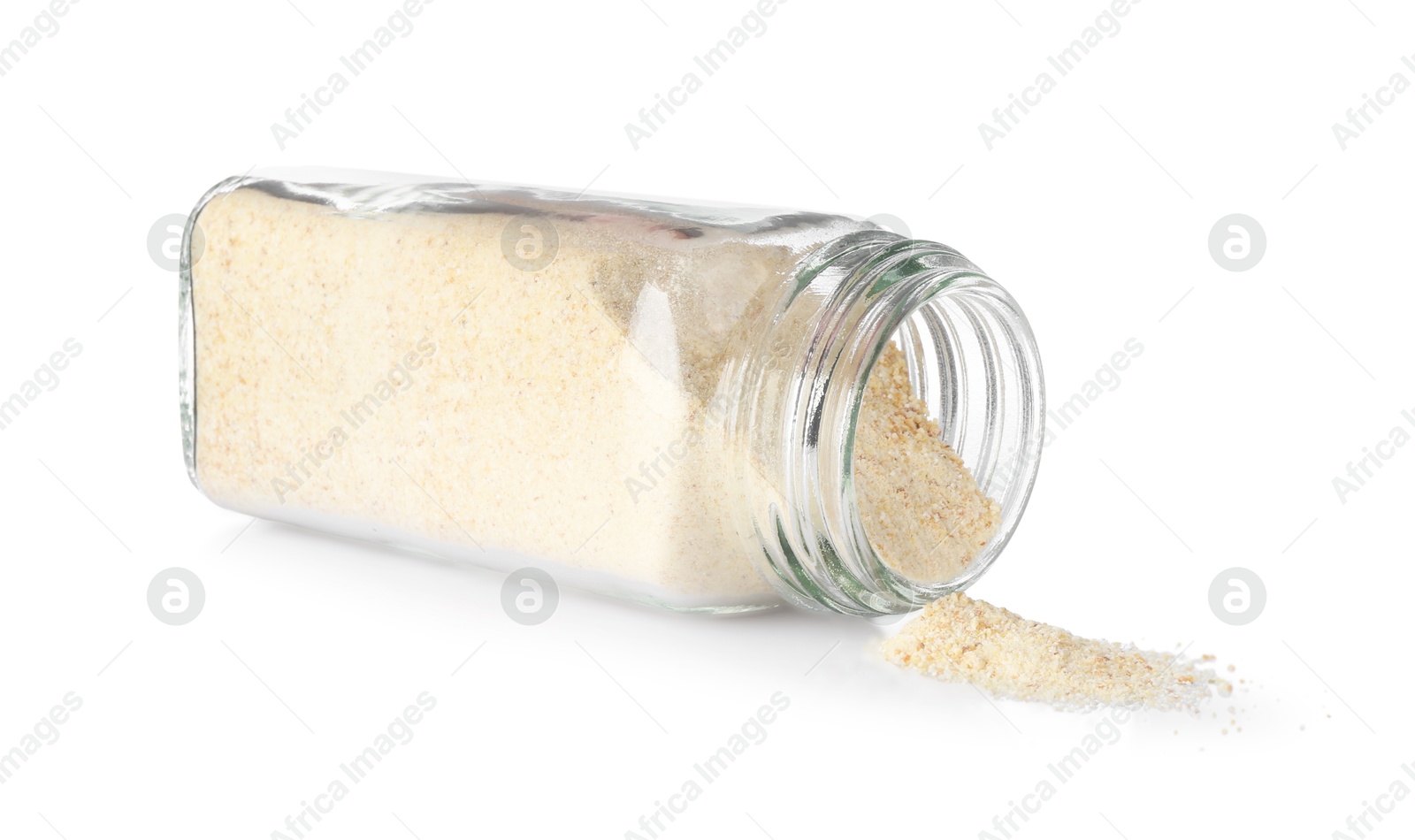 Photo of Garlic powder in glass jar isolated on white. Aromatic spice