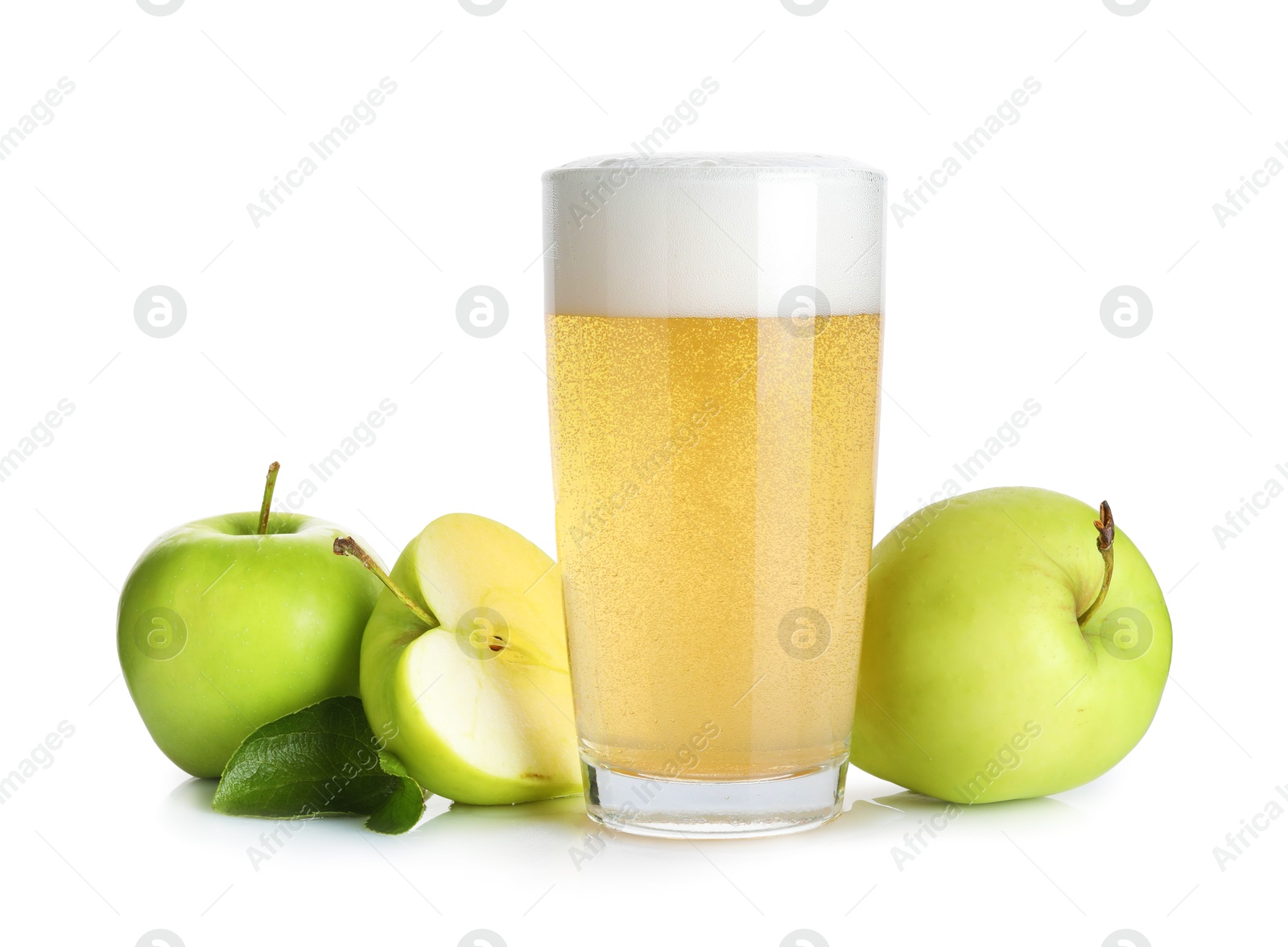 Tasty cider in glass, fresh apples and green leaves isolated on white Photo of Tasty cider in glass, fresh apples and green leaves isolated on white