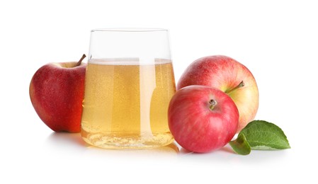 Photo of Tasty cider in glass, fresh apples and green leaves isolated on white