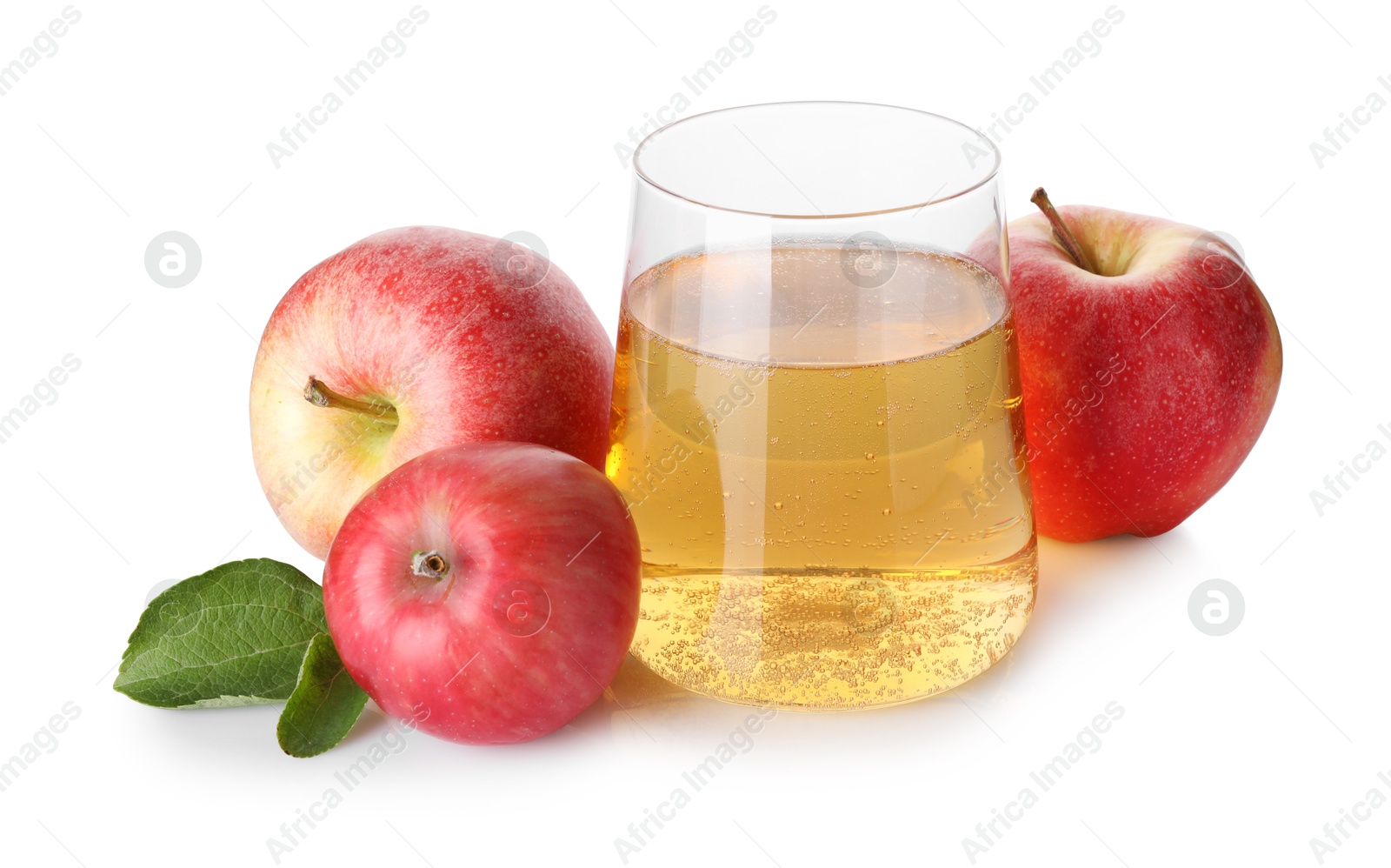 Tasty cider in glass, fresh apples and green leaves isolated on white Photo of Tasty cider in glass, fresh apples and green leaves isolated on white
