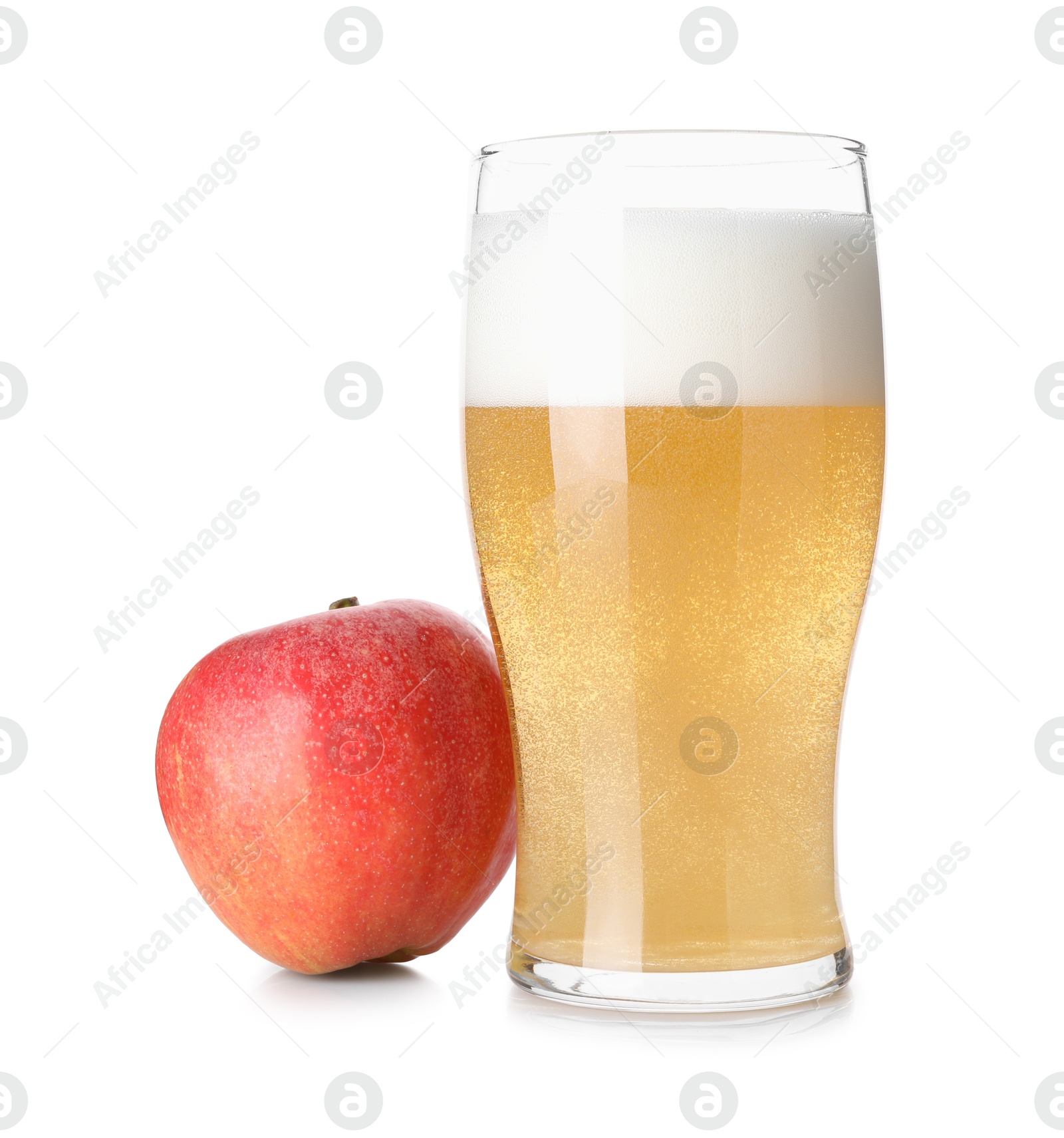 Photo of Tasty cider in glass and fresh apple isolated on white