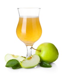 Photo of Tasty cider in glass, fresh apples and green leaves isolated on white