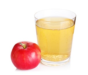 Photo of Tasty cider in glass and fresh apple isolated on white