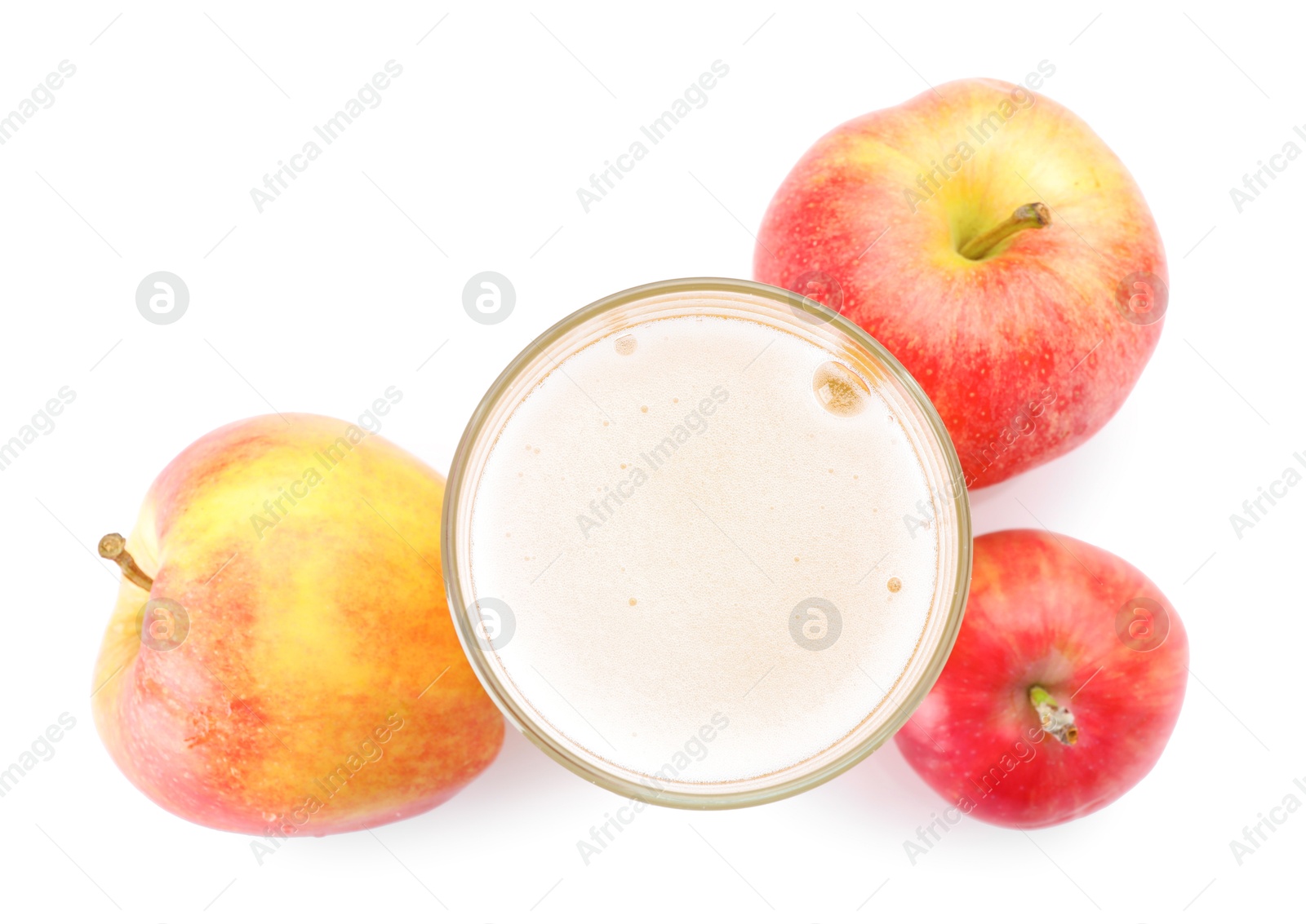 Photo of Tasty cider in glass and fresh apples isolated on white, top view