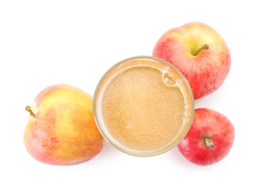 Photo of Tasty cider in glass and fresh apples isolated on white, top view