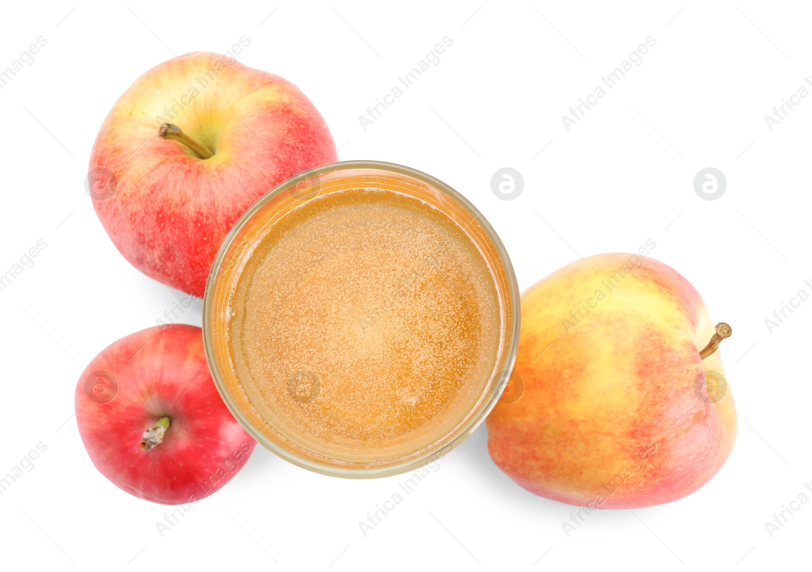 Tasty cider in glass and fresh apples isolated on white, top view Photo of Tasty cider in glass and fresh apples isolated on white, top view