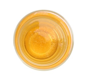 Photo of Tasty cider in glass isolated on white, top view