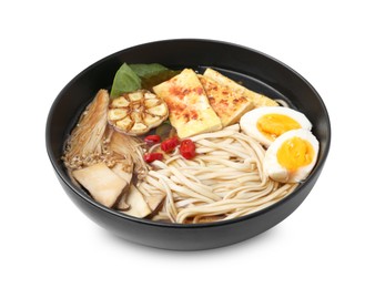 Photo of Tasty ramen with enoki and king oyster (eryngii) mushrooms in bowl isolated on white