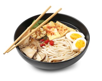 Photo of Tasty ramen with enoki and king oyster (eryngii) mushrooms in bowl isolated on white