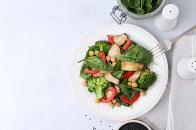 Photo of Tasty salad with eryngium mushrooms served on light table, flat lay. Space for text
