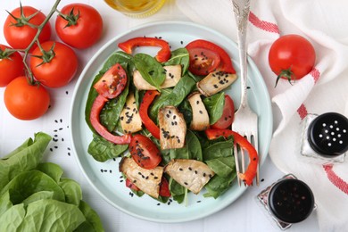Photo of Tasty salad with eryngium mushrooms served on white table, flat lay