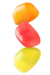 Image of Sweet jelly candies falling against white background