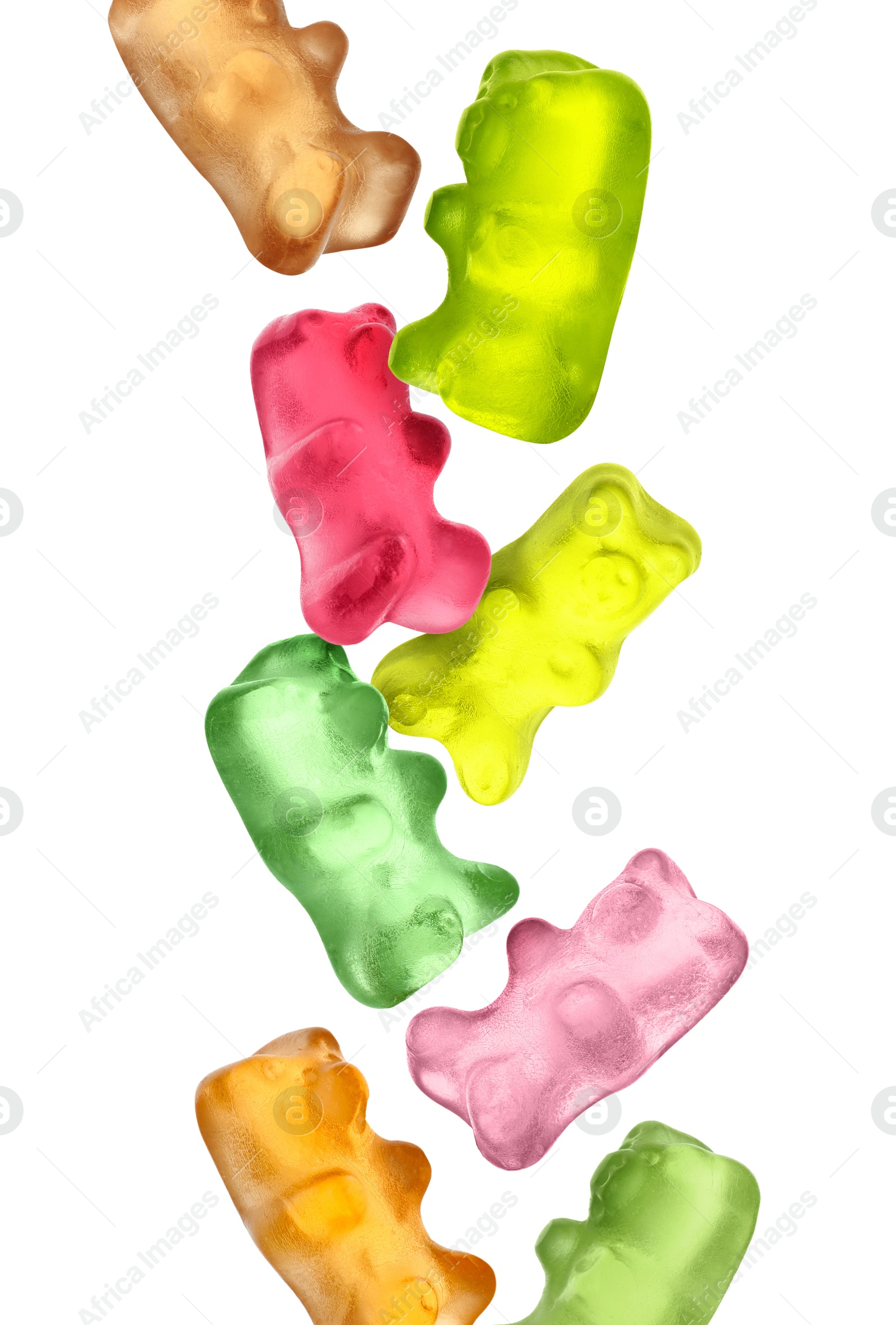 Sweet jelly candies in shape of bear falling against white background Image of Sweet jelly candies in shape of bear falling against white background