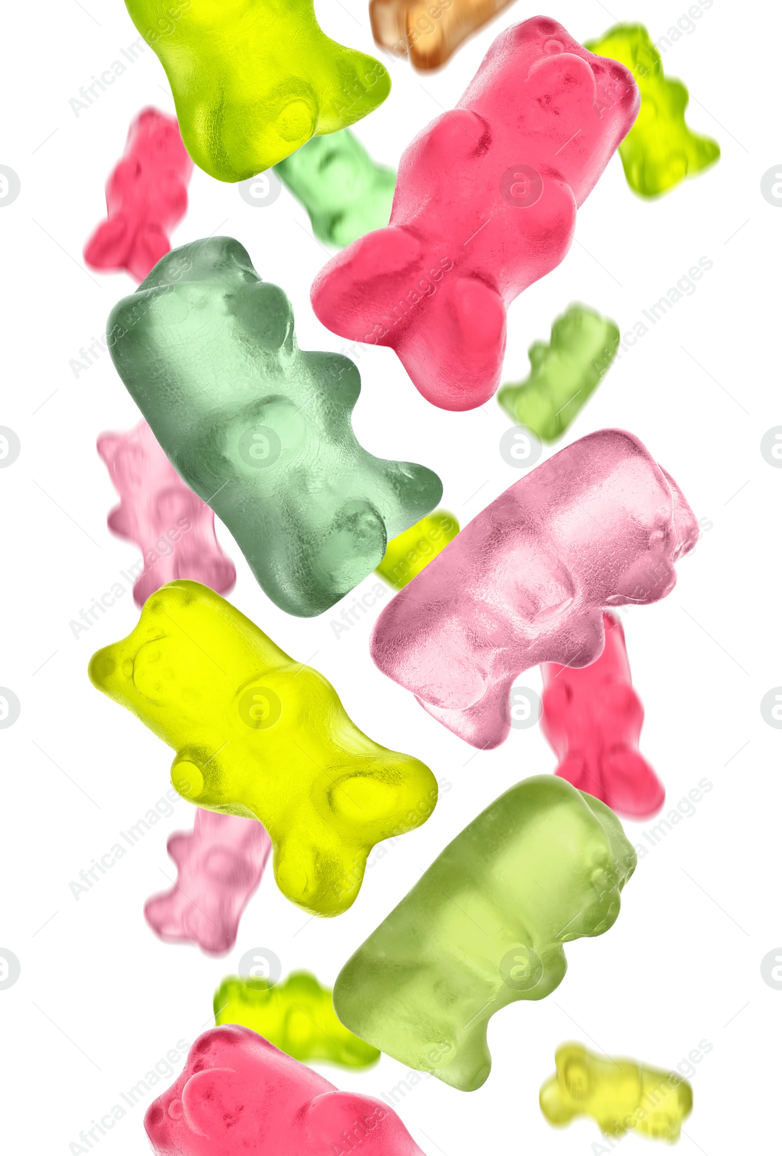 Sweet jelly candies in shape of bear falling against white background Image of Sweet jelly candies in shape of bear falling against white background