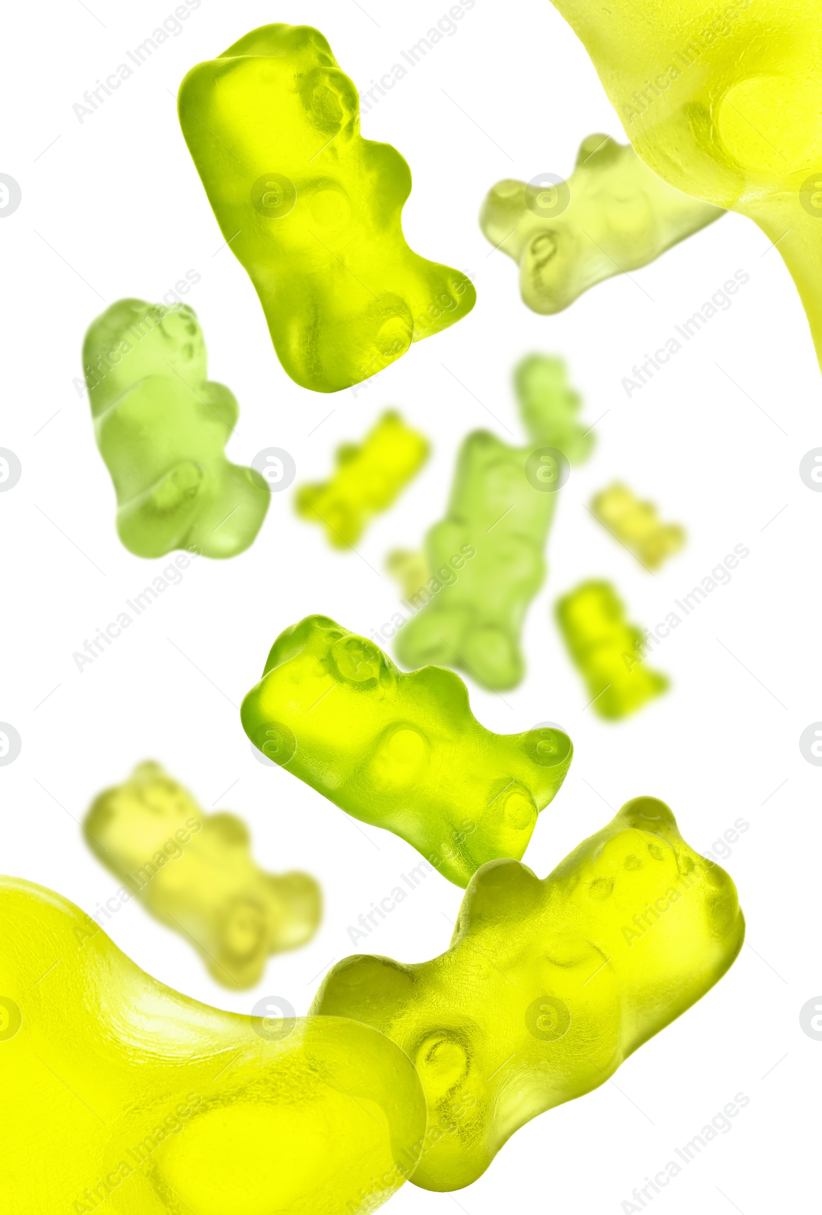 Sweet jelly candies in shape of bear falling against white background Image of Sweet jelly candies in shape of bear falling against white background