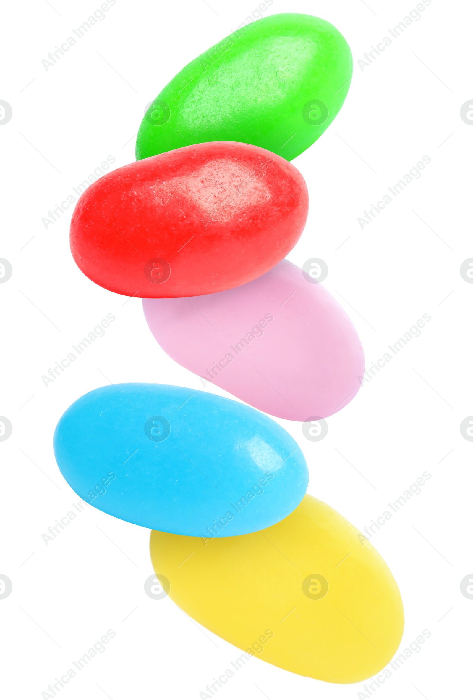 Image of Sweet jelly beans falling against white background