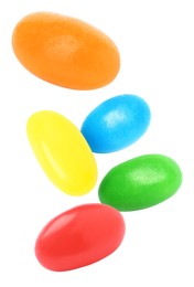 Image of Sweet jelly beans falling against white background