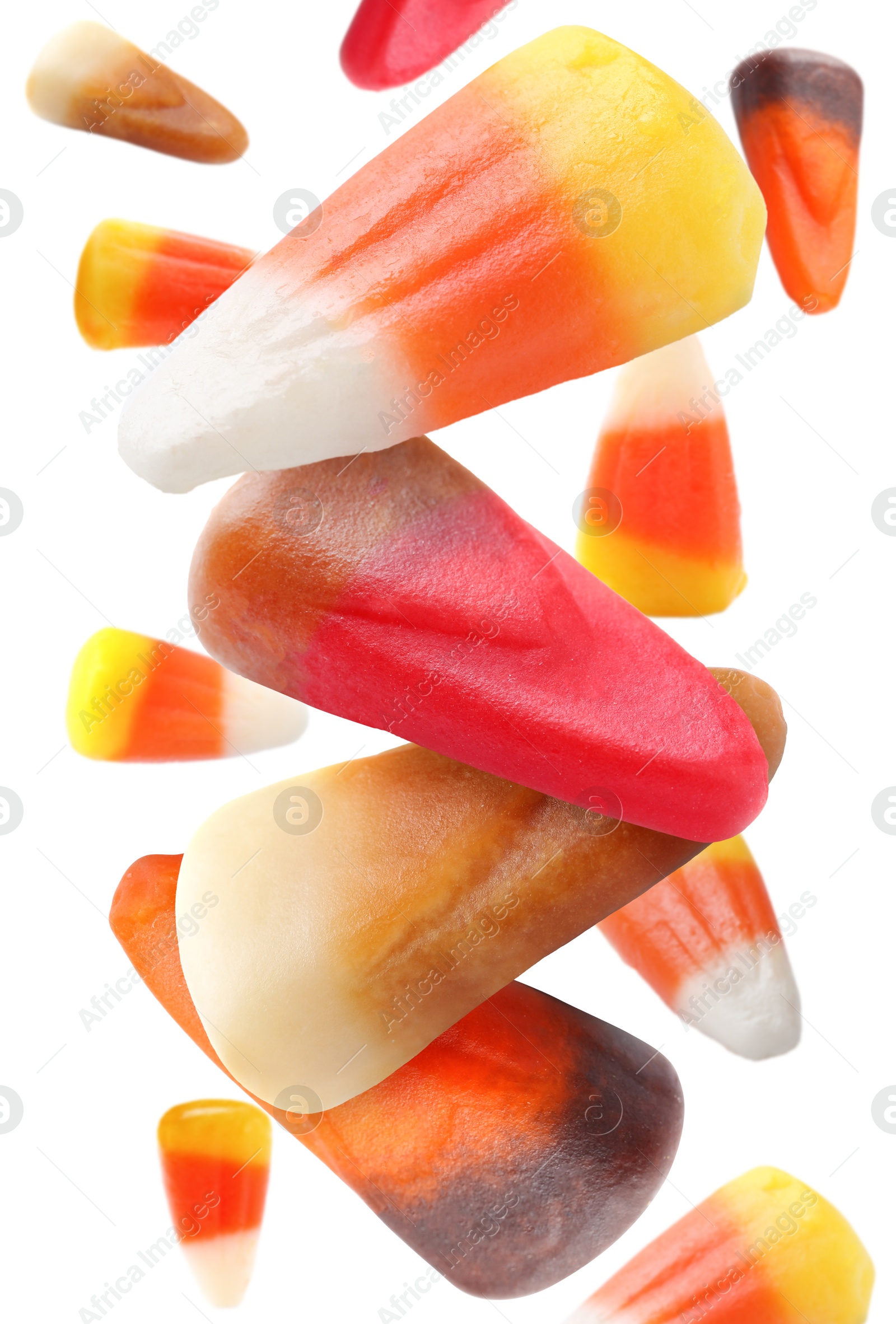 Sweet jelly candies falling against white background Image of Sweet jelly candies falling against white background