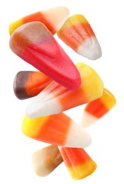 Image of Sweet jelly candies falling against white background