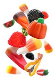Image of Sweet jelly candies falling against white background