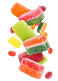 Image of Sweet jelly candies falling against white background