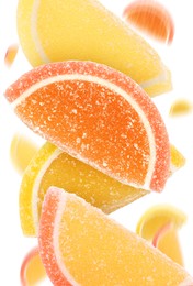 Image of Sweet jelly candies falling against white background