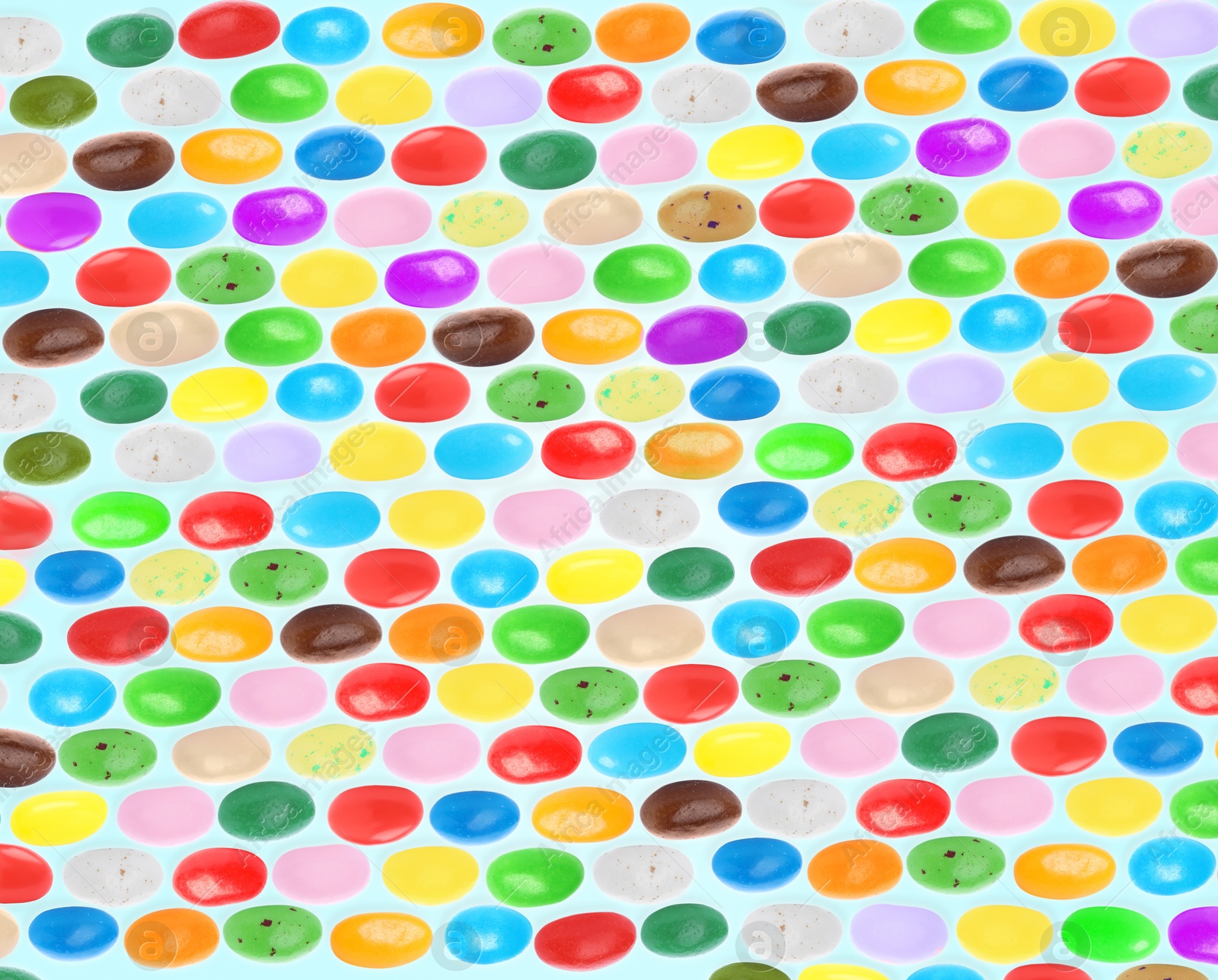 Image of Pattern of sweet jelly beans on white background