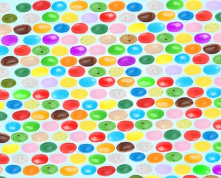 Image of Pattern of sweet jelly beans on white background