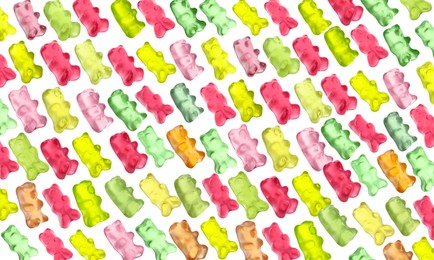 Image of Pattern of sweet gummy bears on white background. Jelly candies