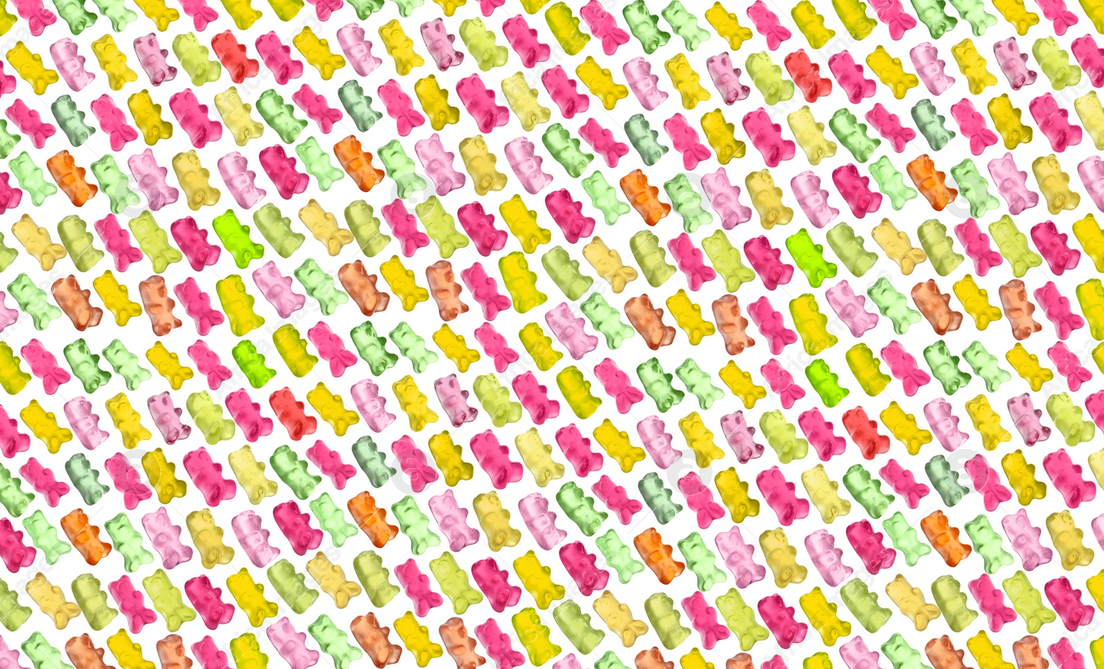 Image of Pattern of sweet gummy bears on white background. Jelly candies