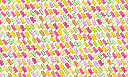 Image of Pattern of sweet gummy bears on white background. Jelly candies