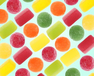 Image of Pattern of sweet jelly candies on light blue background