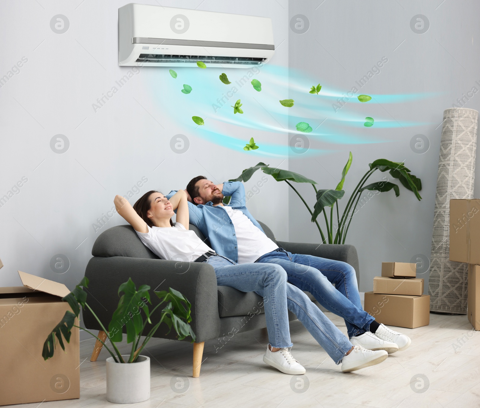 Happy couple resting on couch at home. Air conditioner keeping comfortable temperature in room Image of Happy couple resting on couch at home. Air conditioner keeping comfortable temperature in room