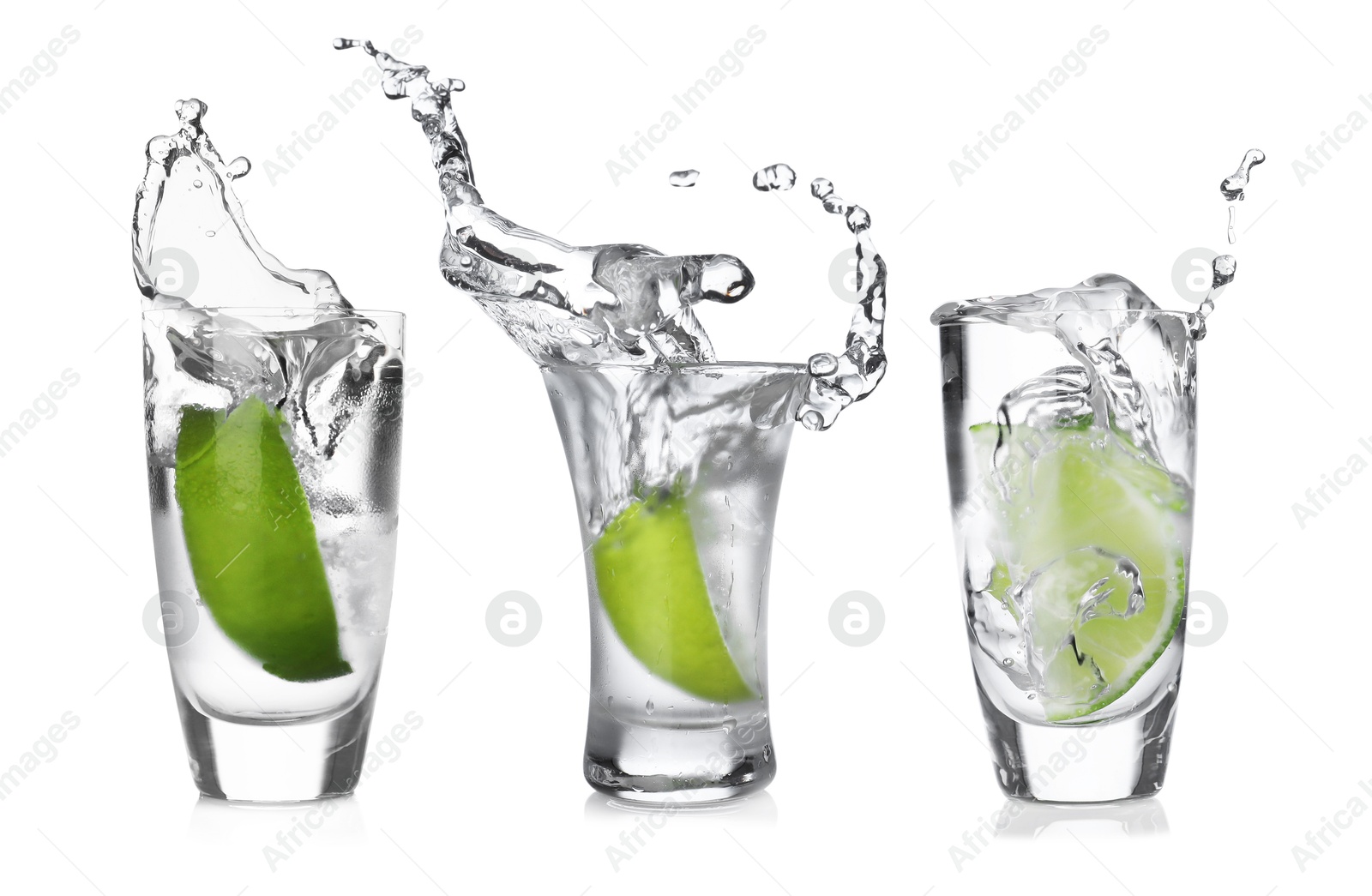 Image of Vodka in shot glasses with lime wedge isolated on white, set