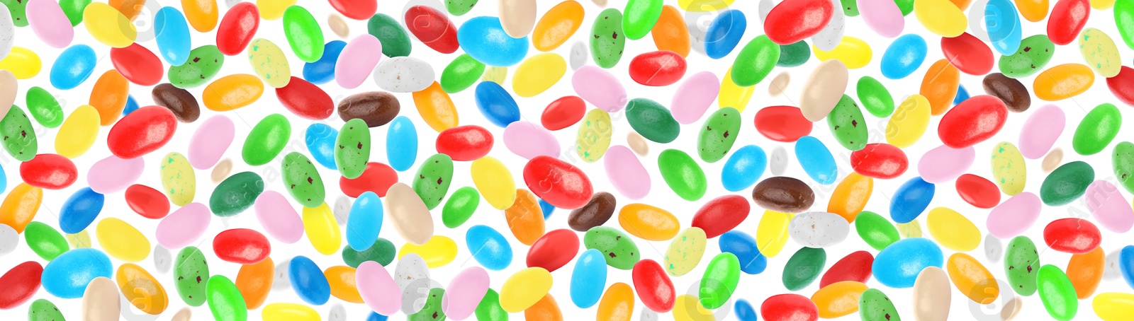 Image of Jelly beans falling against white background, banner design