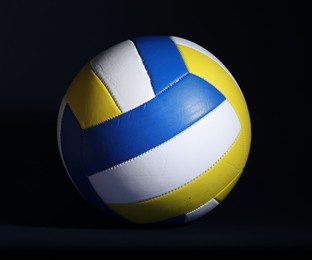 Photo of One volleyball ball on black background, closeup